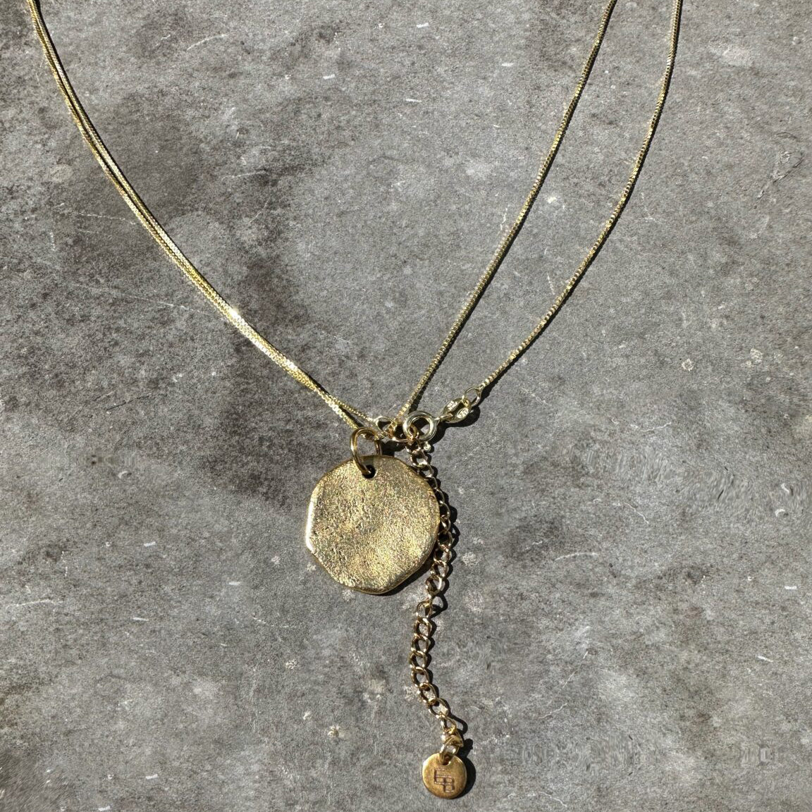 Ellen Beekmans Kette Münze