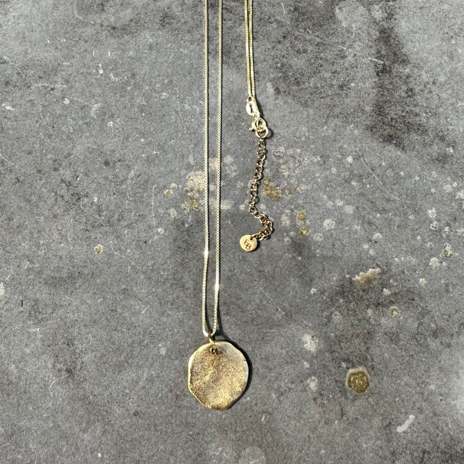 Ellen Beekmans Kette Münze